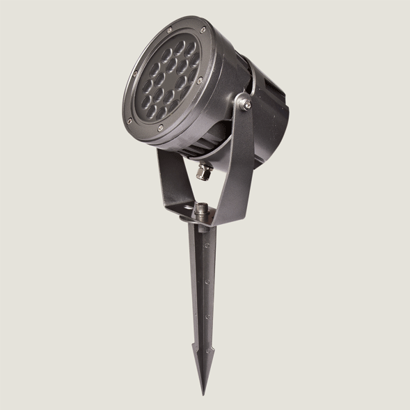 A black midi outdoor spotlight with a spike accessory on a grey background.