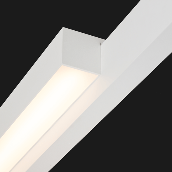 A white single linear led on a black background.