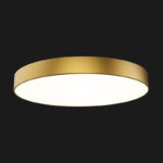 A gold round pendant light with black background.