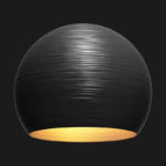 A black and gold sphere textured pendant light on a black background.
