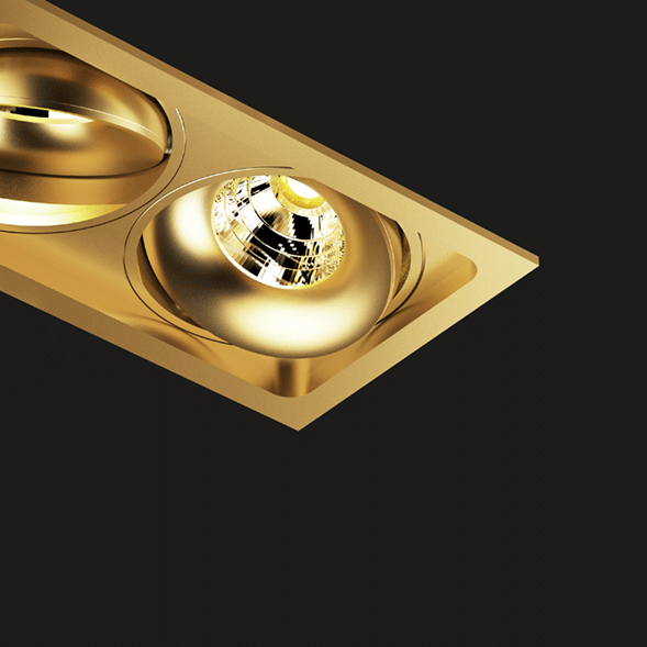 A gold 3 led downlight with black background