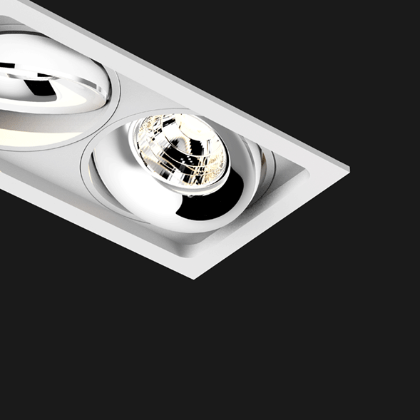 A white and chrome 3 led downlight with black background