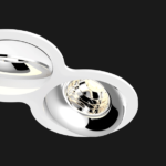 A white and chrome double 8 led downlight with black background