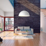 A beautiful modern living room with a white dome pendant light.